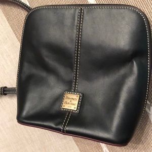 Dooney & Bourke crossbody purse! Color is black outside and red in the inside.